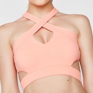Dolls Kill halter neck cutout sports bra